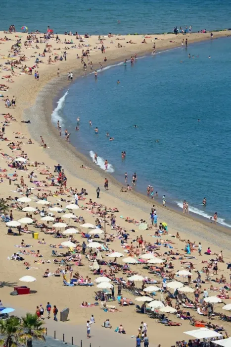  : Aerial view of crowds on the crowded beach, Barcelona, Spain