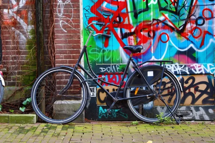 : Bicycle and colourful graffiti street scene in Amsterdam, Holland