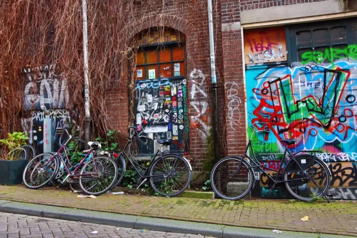  : Bicycle and colourful graffiti street scene in Amsterdam, Holland
