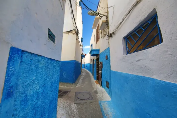  : Blue and white walls of buildings in the Kasbah of the Udayas in Rabat, Morocco