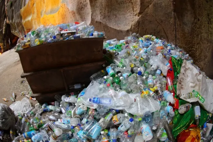  : Empty bottles and rubbish for recycling inside the Batu Caves, a Hindu shrine in Kuala Lumpur, Malaysia
