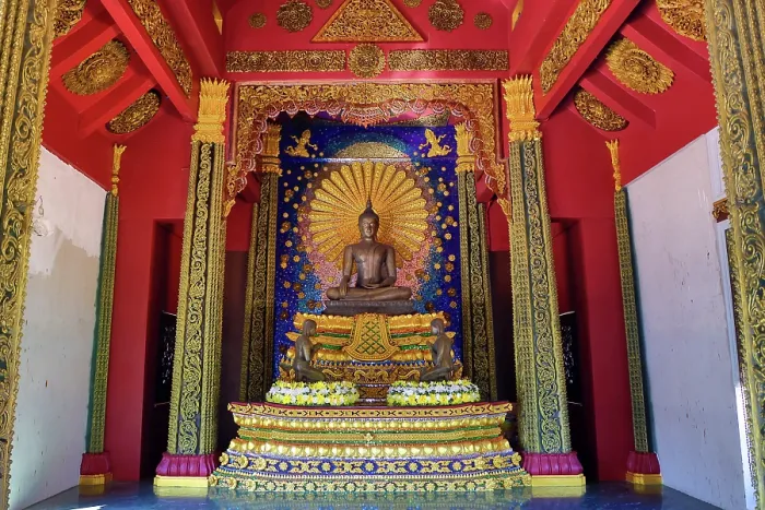  : Buddha statue and shrine at Wat Ko Kaew Pitsadan Temple, Koh Samet, Thailand