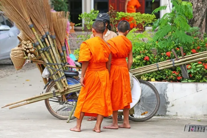  : Buddhist Monks buying brushes, Vientiane, Laos
