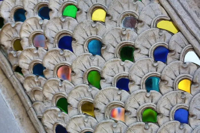  : Coloured glass decorations on statues outside Wat Inthakhin Sadue Muang Temple in Chiang Mai, Thailand
