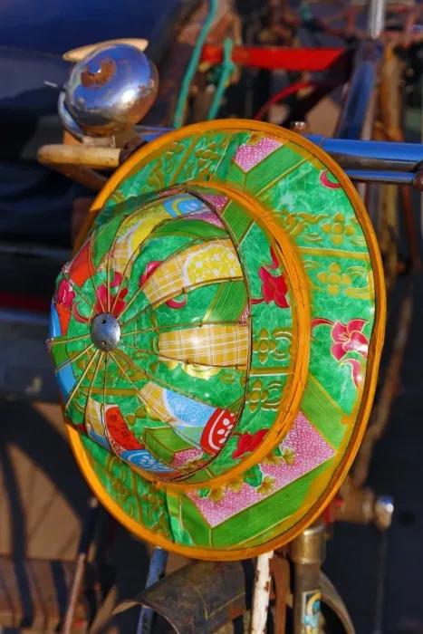 : Colourful hat hanging on a bicycle, Yangon, Myanmar