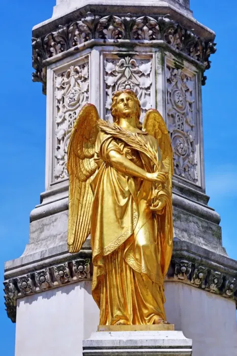  : Gold angel statue on the column beside Zagreb Cathedral in Zagreb, Croatia