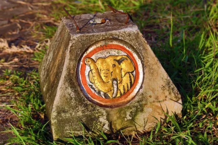  : Gold elephant on road marker stone, Vientiane, Laos