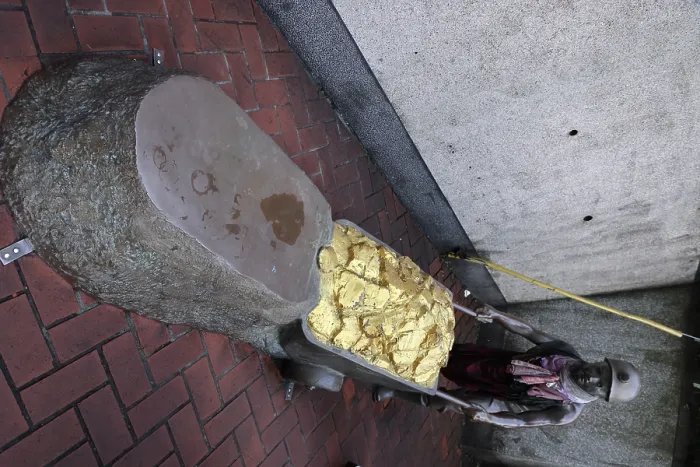  : Gold mining monument of a goldmine worker at Jiufen Old Street in Jiufen, Taiwan ROC