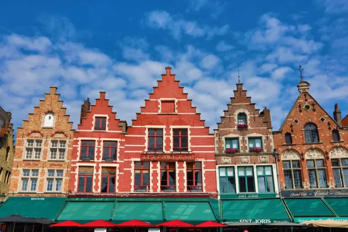  : Guild houses converted into restaurants in the Market Square or Markt, Bruges, Belgium