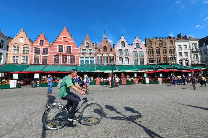  : Guild houses converted into restaurants in the Market Square or Markt, Bruges, Belgium