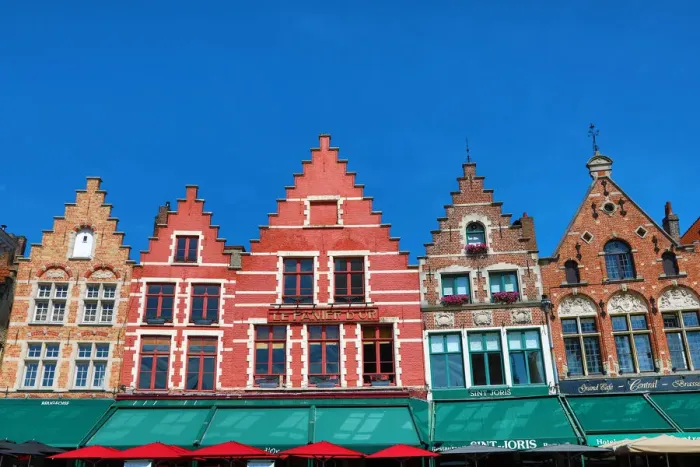  : Guild houses converted into restaurants in the Market Square or Markt, Bruges, Belgium