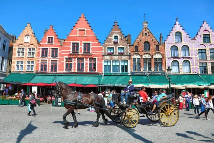  : Guild houses converted into restaurants in the Market Square or Markt, Bruges, Belgium