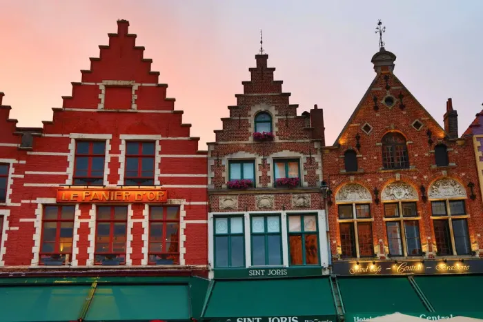  : Guild houses converted into restaurants in the Market Square or Markt, Bruges, Belgium