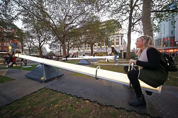 Impulse, a sea of singing seesaws installation, Leicester Square, London