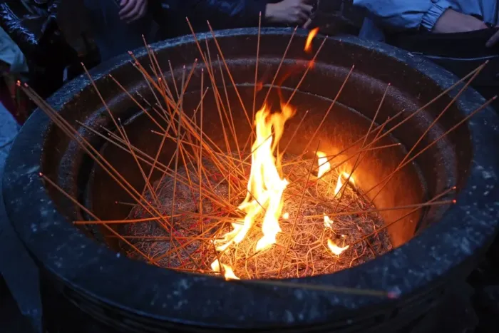  : Incense sticks burning at the Longshan Buddhist Temple at Chinese New Year in Taipei, Taiwan