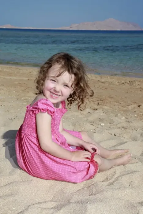  : Model released child on summer beach holiday