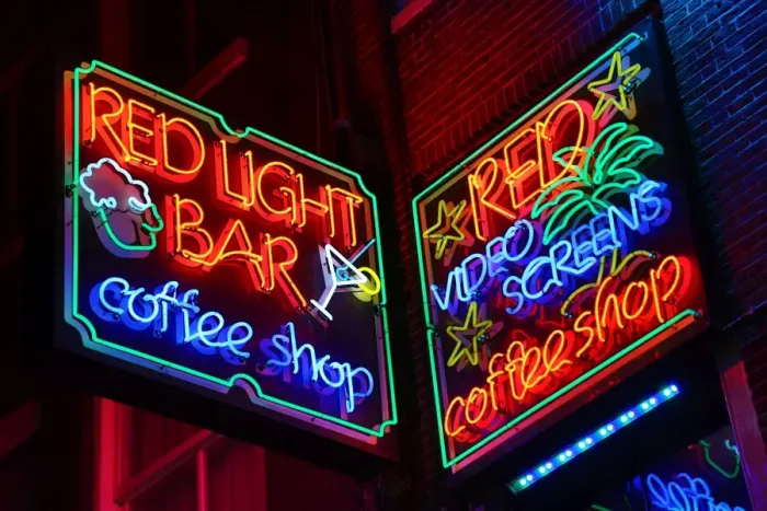  : Neon lights of the Red Light Bar Coffeeshop in the Red Light District in Amsterdam, Holland