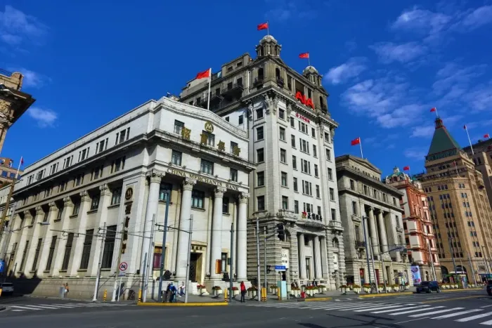  : North China Daily News Building housing AIA, American International Assurance, and the China Merchant Bank building on the Bund, Shanghai, China