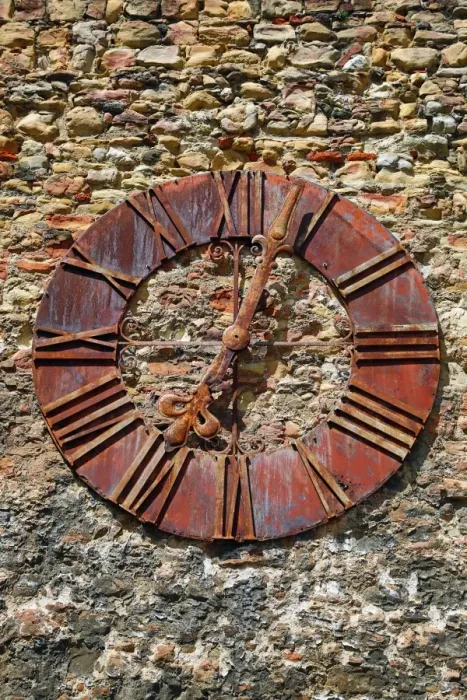  : Old rusty clock on the wall beside Zagreb Cathedral in Zagreb, Croatia