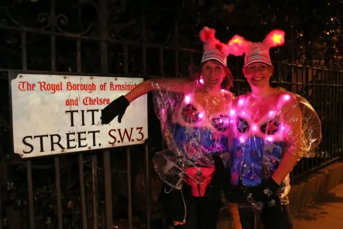  : Participants at the Moonwalk charity marathon walk with decorated bras, London
