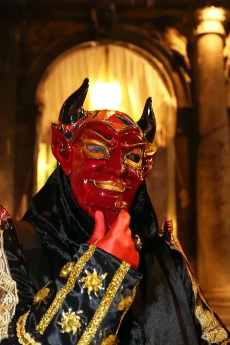  : Person wearing a demon mask and costume at the Venice Carnival