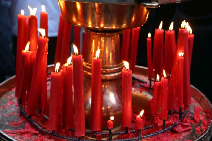 : Red candles burning at the Longshan Buddhist Temple at Chinese New Year in Taipei, Taiwan : Red candles burning at the Longshan Buddhist Temple at Chinese New Year in Taipei, Taiwan