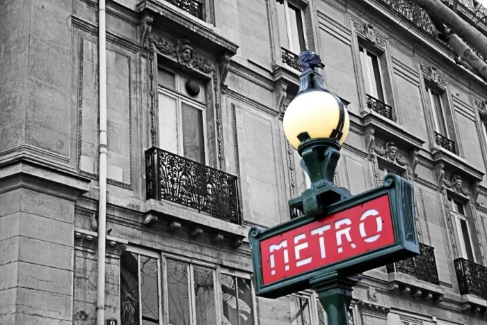  : Red French Metro subway sign in the street in Paris, France, spot colour