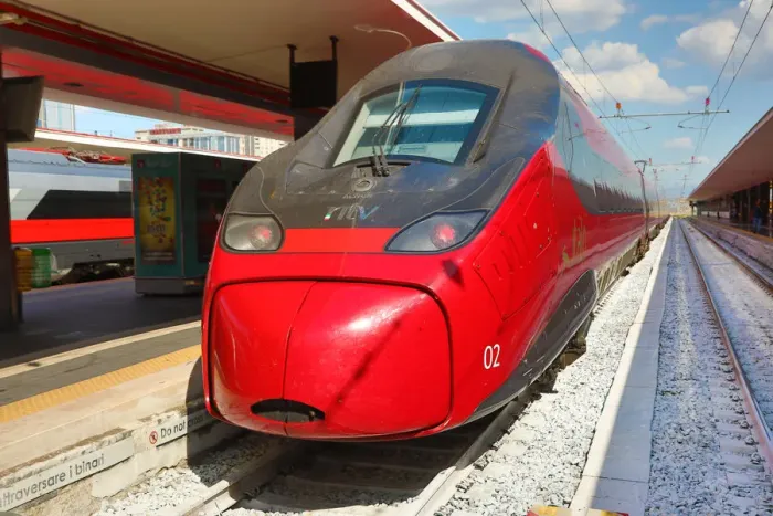  : Red Italian high speed train in Naples station, Italy