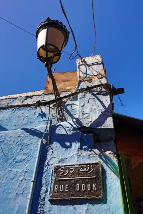  : Rue Douk street sign in the streets of the Medina of Rabat, Morocco