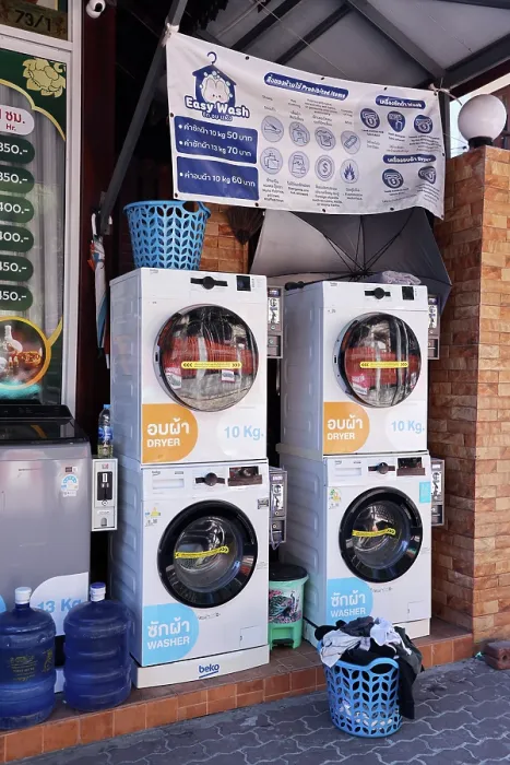  : Self-service street launderette for tourists to do laundry on Koh Samet island, Thailand