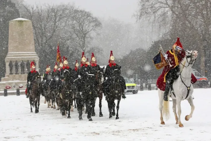  : Snow spooks horse at the Changing of the Queens Life Guards, London