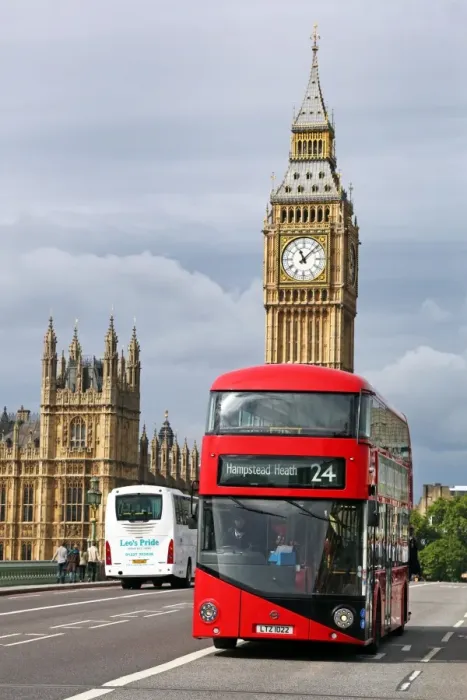  : Souvenir Red London Double-Decker Bus and Big Ben, Houses of Parliament. Westminster Bridge, London, England