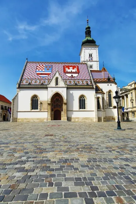  : St. Marks Church and cobbles of St. Marks Square in Zagreb, Croatia