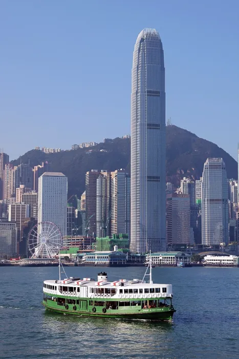  : Star Ferry crossing Victoria Harbour with the city skyline in Hong Kong, China