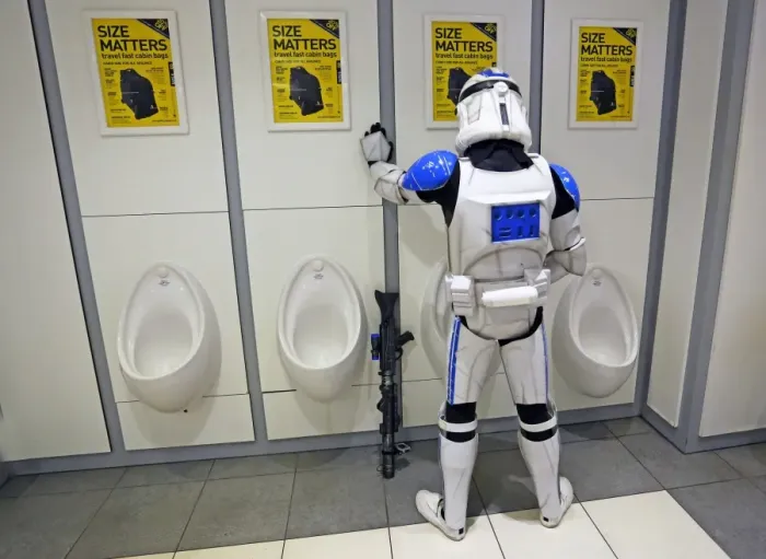  : A Star Wars Stormtrooper takes a loo break at MCM London Comic Con at Excel London