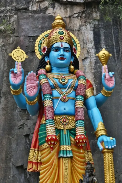  : Statue of Krishna at the Ramayana Cave at the Batu Caves, a Hindu shrine in Kuala Lumpur, Malaysia