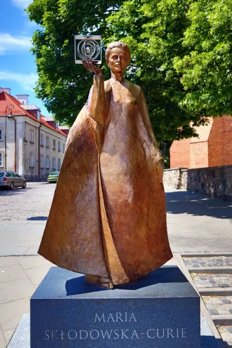  : Statue of Marie Sklodowska-Curie holding a model of Polonium in Warsaw, Poland
