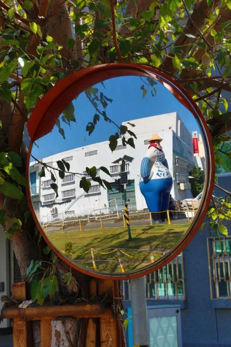  : Statue at the Pier 2 Art Center in a mirror, Kaohsiung City, Taiwan