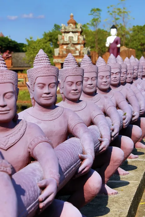 : Statues forming a bridge at Muang Boran, The Ancient City, historical museum of reproductions of famous Thai buildings, Bangkok, Thailand