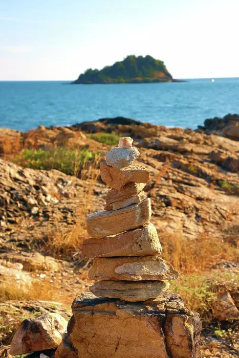  : Stone cairn at Ao Pakarang viewpoint at the tip of Koh Samet island, Thailand