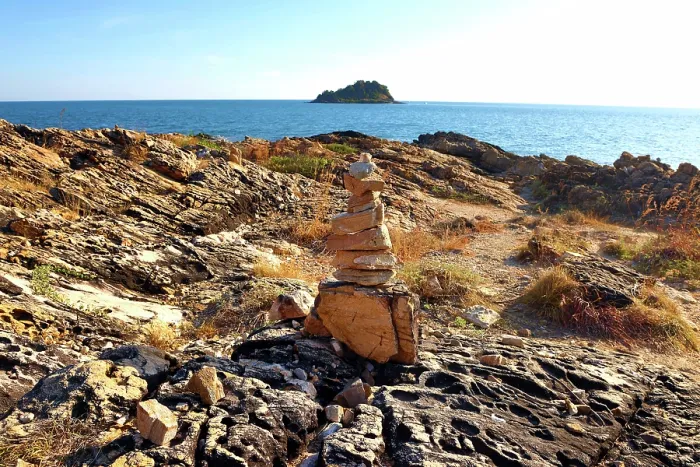  : Stone cairn at Ao Pakarang viewpoint at the tip of Koh Samet island, Thailand