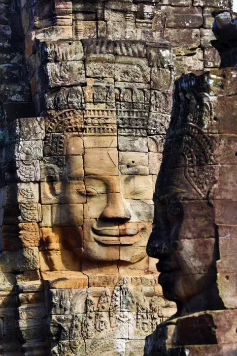  : Stone face in the ruins of the Bayon Khmer Temple, Angkor Thom, Siem Reap, Cambodia