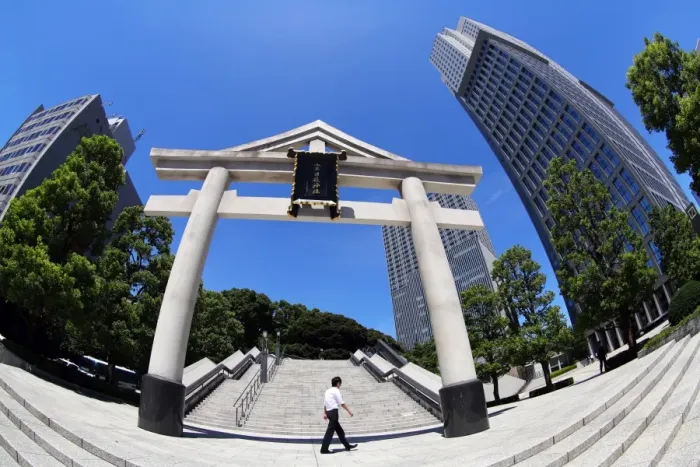  : Stone Torii gate and office buildings outside the Hie-Jinja Shinto Shrine, Tokyo, Japan