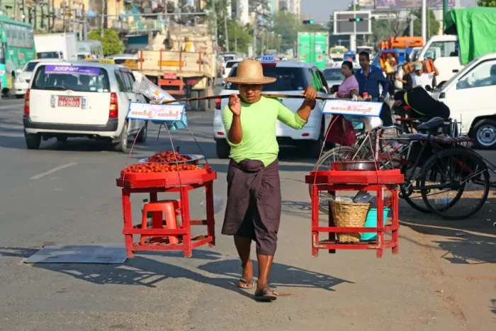  : Street seller carrying wares on his shoulders, Yangon, Myanmar