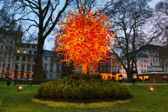  : The Sun glass sculpture by Dale Chihuly comes out at night in Berkeley Square, London