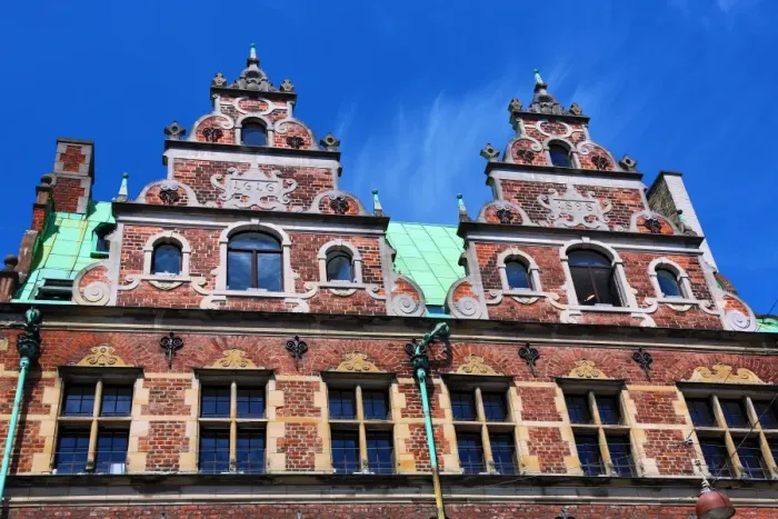  : Traditional architecture of the Royal Copenhagen shop building roof in Stroget in Copenhagen