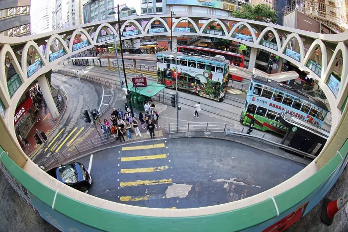 : Traditional Hong Kong electric tram at Yee Wo Street circular pedestrian bridge in Causeway Bay, Hong Kong, China : Traditional Hong Kong electric tram at Yee Wo Street circular pedestrian bridge in Causeway Bay, Hong Kong, China