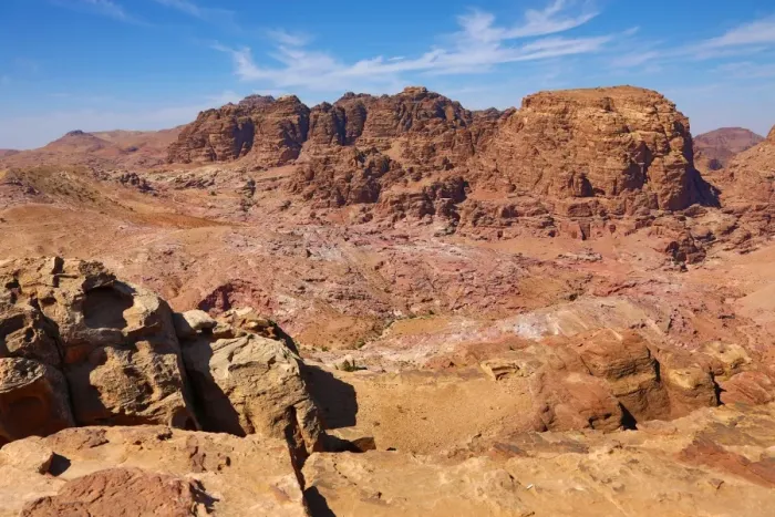  : View of sandstone rock formations overlooking the valley of the rock city of Petra
