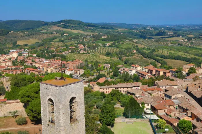  : View from the Torre Grossa over the rooftops of San Gimignano and the Tuscan countryside