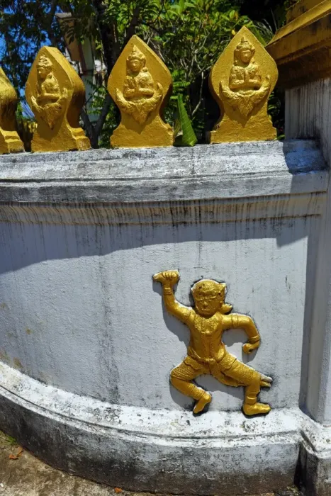  : Wall decoration at Wat Xieng Mouane Temple, Luang Prabang, Laos